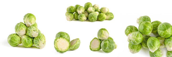 Brussels sprouts. Large set of fresh brussels sprouts in stacks on a white isolated background. Deep focus stacking.