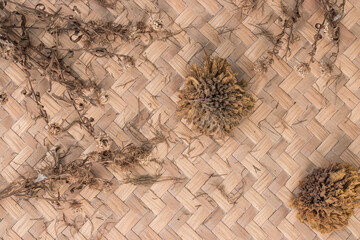 The dried flower arrangement has sugar on the patterned space.