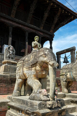 Stone elephants guard the entrance to the Uma Maheshwar temple in Kirtipur in the Kathmandu Valley,...