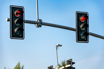 road traffic light on blue sky background