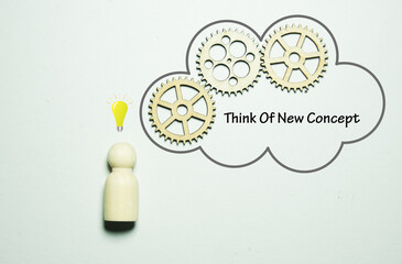 A picture of wooden nature people, gear, dialog box light bulb and the word Think of New Concept.