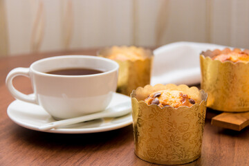 cup of tea with cupcake