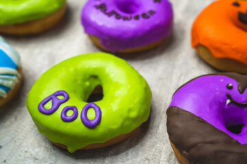 Funny little monster donut for halloween bright colors with little eyes