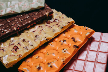 handmade chocolate tile on black background