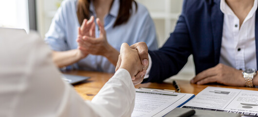 Managers and job applicants shake hands after the job interview, job interviews to find people to...