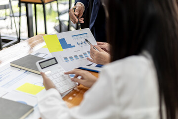 Meeting room atmosphere of a startup company, the finance department is meeting with executives to present financial programs, brainstorming sessions. Concept of company financial management.