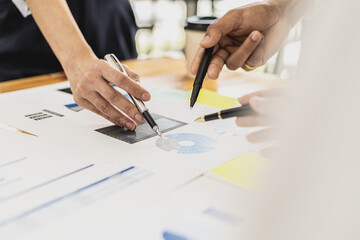 Executives and managers are meeting in a conference room, on the table there are some documents about the company's finances, managers are discussing financial information with the management.