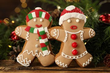 Delicious homemade Christmas cookies and festive decor on wooden table