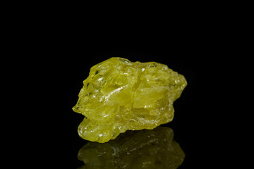 Macro mineral sulfur stone on a black background