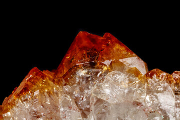 Macro mineral stone Citrine in rock in crystals on a black background