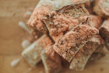Close up of crispy stick breads with cheese powder.