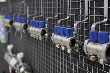 Water manifolds in a plumbing store - obrazy, fototapety, plakaty