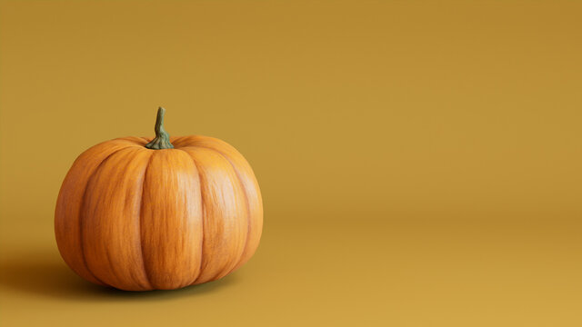 Seasonal background Wallpaper with copy-space. Pumpkin on Mustard Yellow color. Autumn Concept.