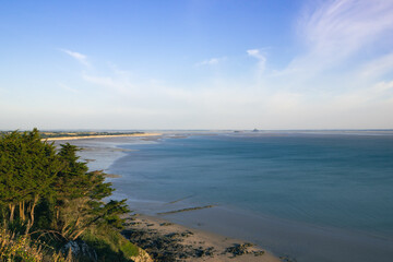 distant view of the isle of Mont Saint Michel / Normandy / France