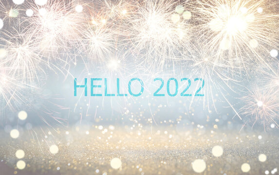 Text Hello 2022 against festive background with fireworks, bokeh effect - Powered by Adobe