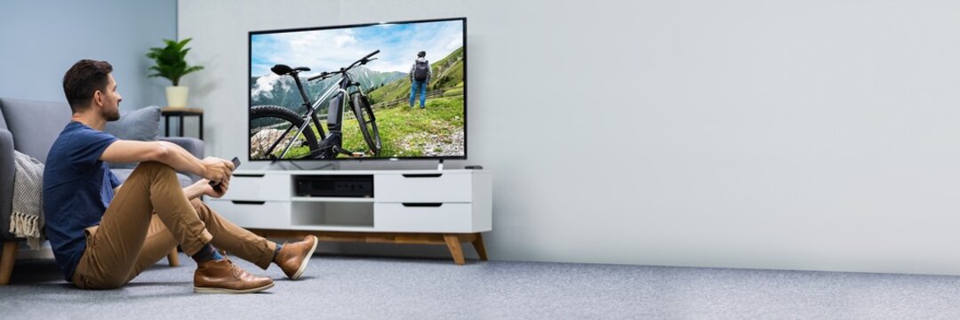 Man Watching Connected TV Screen