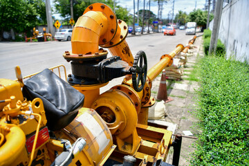 large water pump mounted on the drain pipe