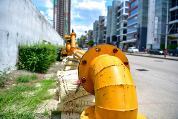 large water pump mounted on the drain pipe