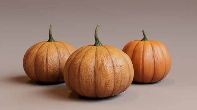 Seasonal background Image. Trio of Pumpkins on Dusty Pink color. Autumn Concept.
