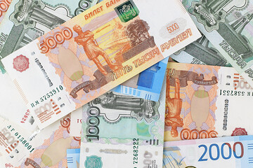 Money background. Russian banknotes. Currency exchange. Financial crisis, ruble devaluation concept. Top view, flat lay. Selective focus.