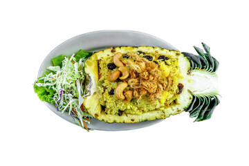 Famous Thai food, Pineapple fried rice in pineapple fruit bowl on isolated white background