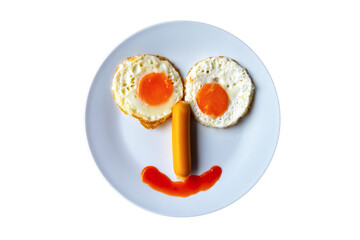 Smiling face frying eggs breakfast on a plate isolated white background