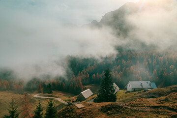 Fototapeta na wymiar Cloudy autumn day in the italian alps