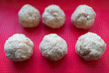 woman makes homemade minced meatballs