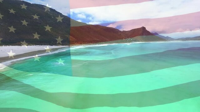 Digital composition of waving us flag against aerial view of the beach and sea waves