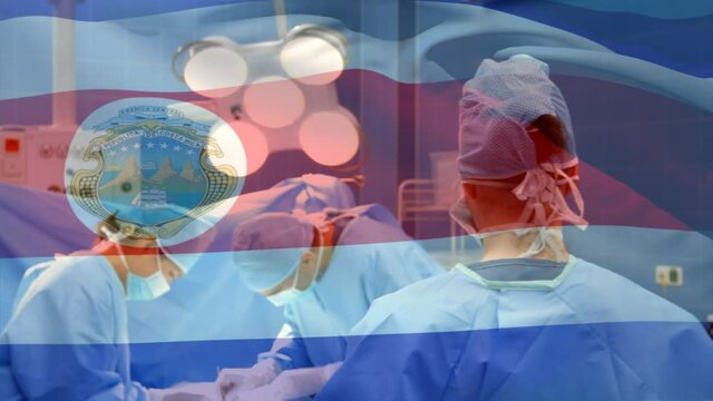 Animation of flag of costa rica waving over surgeons in operating theatre