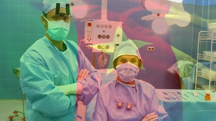 Animation of flag of cameroon waving over surgeons in operating theatre - Powered by Adobe