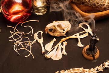 Witchcraft table set, selective focus. Alchemy and esoteric symbol items for magic cult. Spiritual...