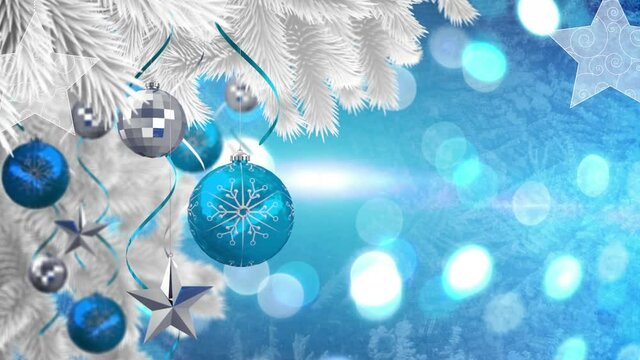 Animation of christmas tree balls over christmas garlands bokeh on blue background
