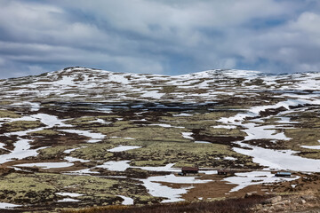 landscape with snow Rondane, Norway, spring