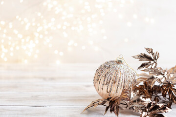 Golden christmas balls with bokeh. © gitusik