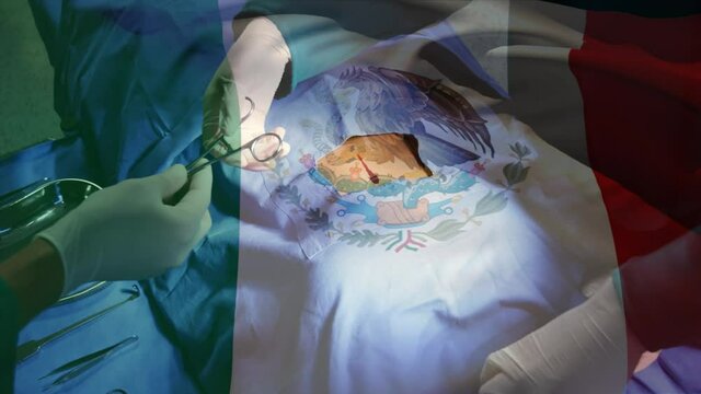 Animation of flag of mexico waving over surgeons in operating theatre