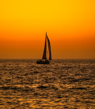 Sailboat Silhouette Ocean Sunset Vertical
