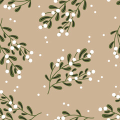 Christmas seamless pattern. Mistletoe on a beige background