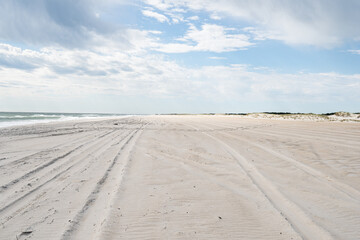 wide open empty tourist beach closed for the year or due to emergency storm flooding and potential evacuation during hurricane season 
