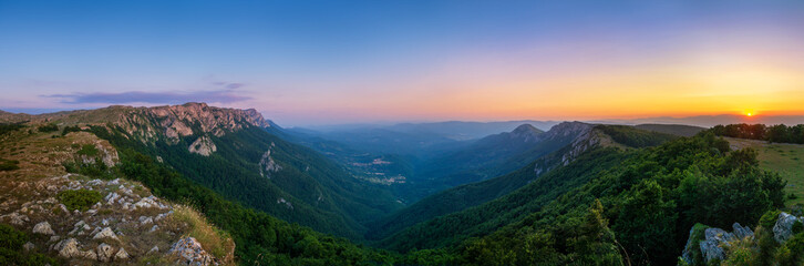 Naklejka premium Sunset at the mountain