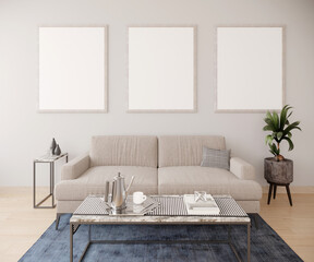 Mockup para tres cuadros en pared con sofá y mesa de centro. 3d render