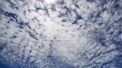 Broken clouds in the blue sky