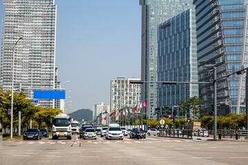 The expressway and the modern city skyline are in Korea