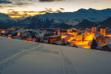 Famous mountain ski resort with spectacular sunrise, La Toussuire, France