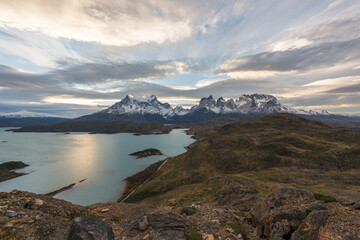Fototapeta na wymiar The Torres del Paine National Park sunset view. Torres del Paine is a national park encompassing mountains, glaciers, lakes, and rivers in southern Patagonia, Chile.