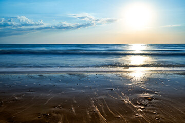Obraz premium Sea sunset. Quiet calm sea. Sand beach.