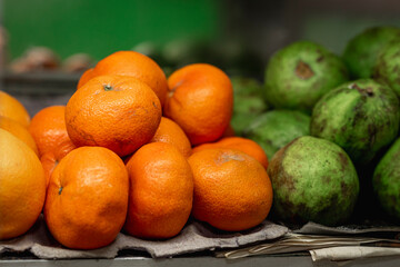 group of oranges in the urn of a greengrocer's shop