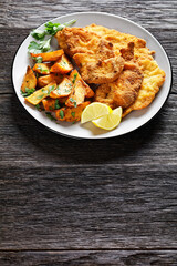 crispy Chicken Cutlets with spicy roasted potatoes