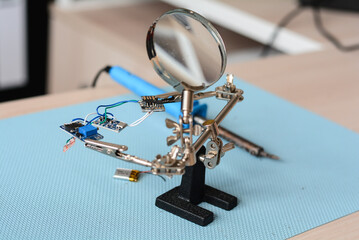 magnifying glass on a book