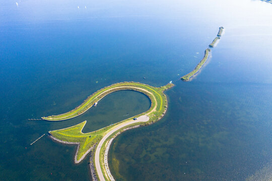 Aerial view of Tulpeiland in Wolderwijd off the coast of Zeewolde, artificial peninsula in the shape of a tulip. The elongated natural islands form the trunk. Zeewolde, Flevoland, the Netherlands